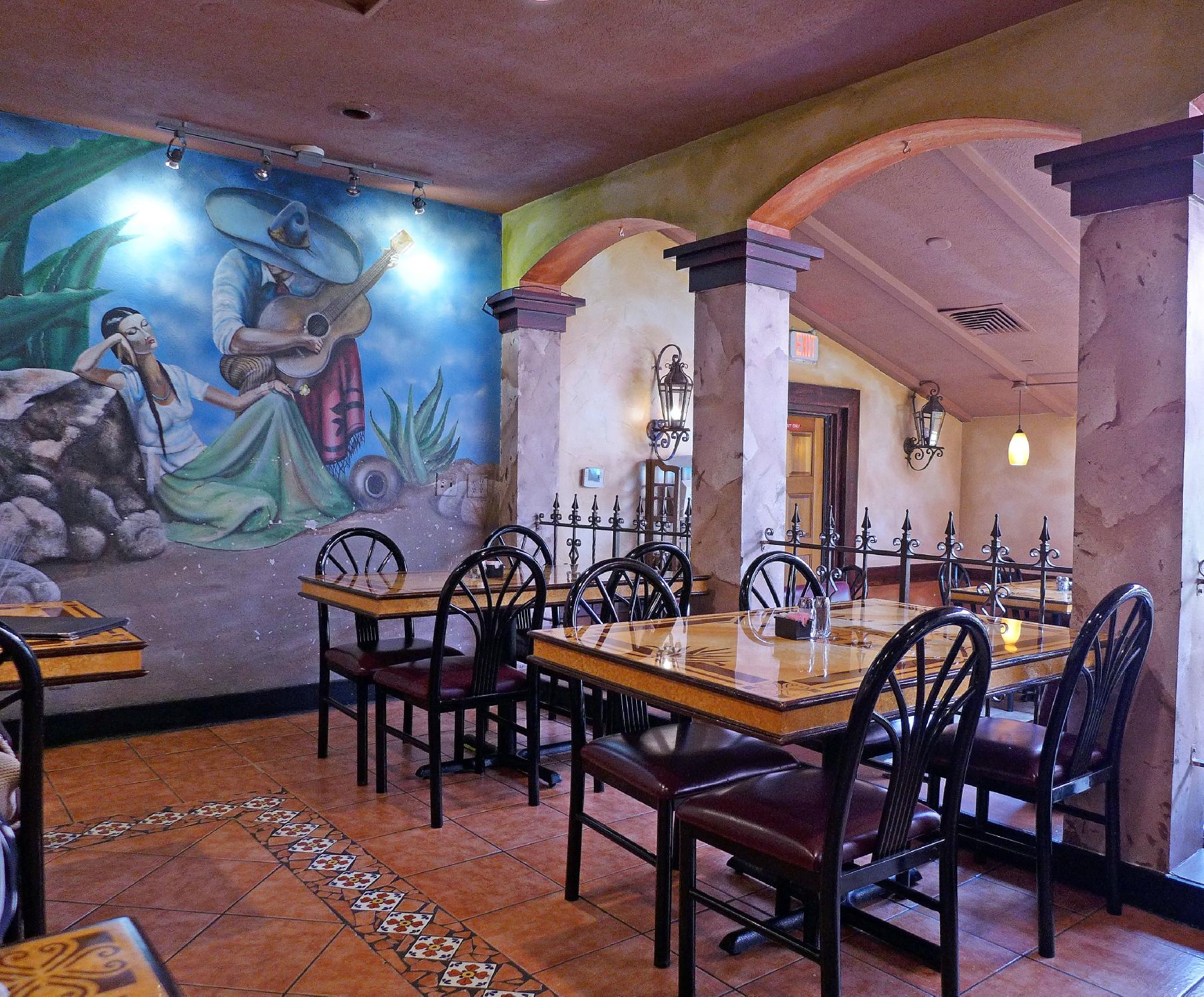 The warm, lively dining room at Los Agaves Mexican Grill in Moline