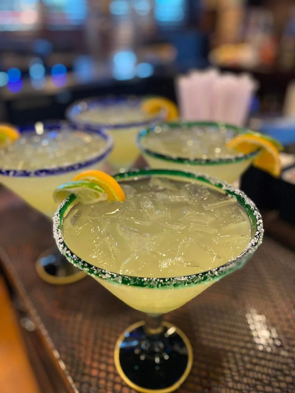 Fresh margaritas lined up at the bar